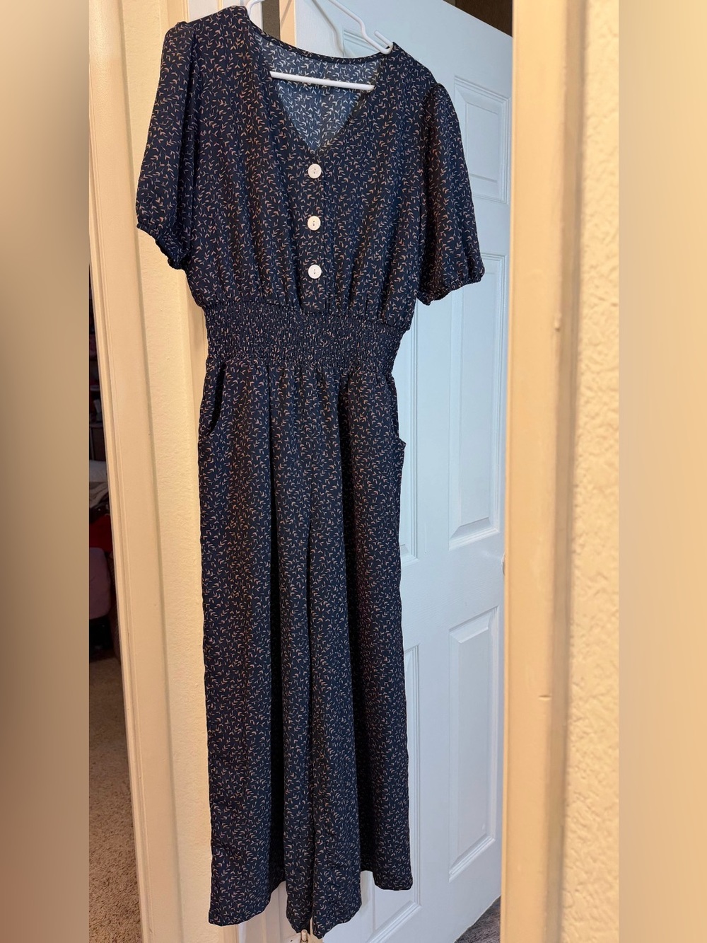 Women’s Navy Smocked Waist unbuttoned Jumpsuit with Flutter Sleeves